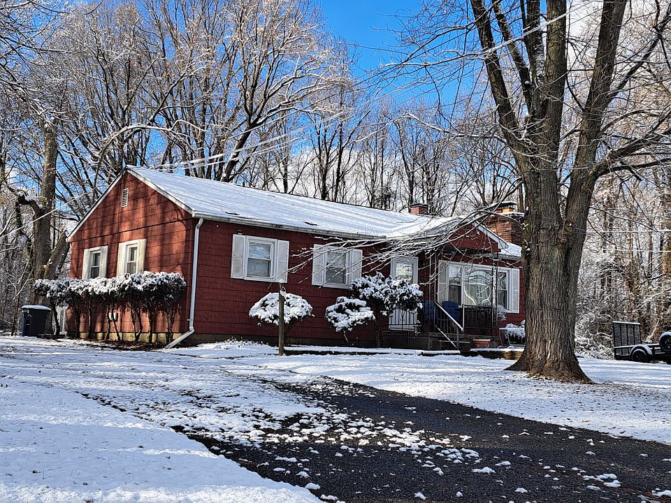Cozy home is surrounded by nature with the Chesapeake Bay just across the street.