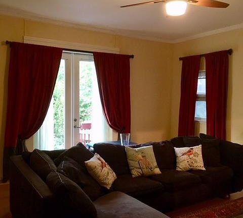 Spacious living room. French doors to deck, patio, garden