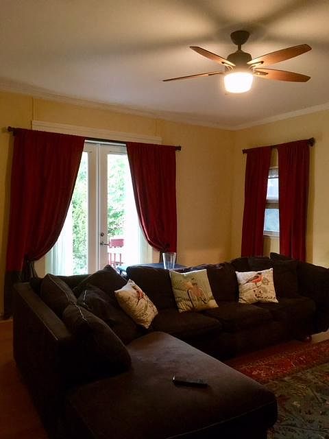 Spacious living room. French doors to deck, patio, garden