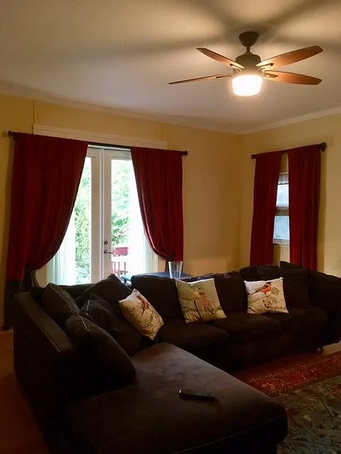Spacious living room. French doors to deck, patio, garden