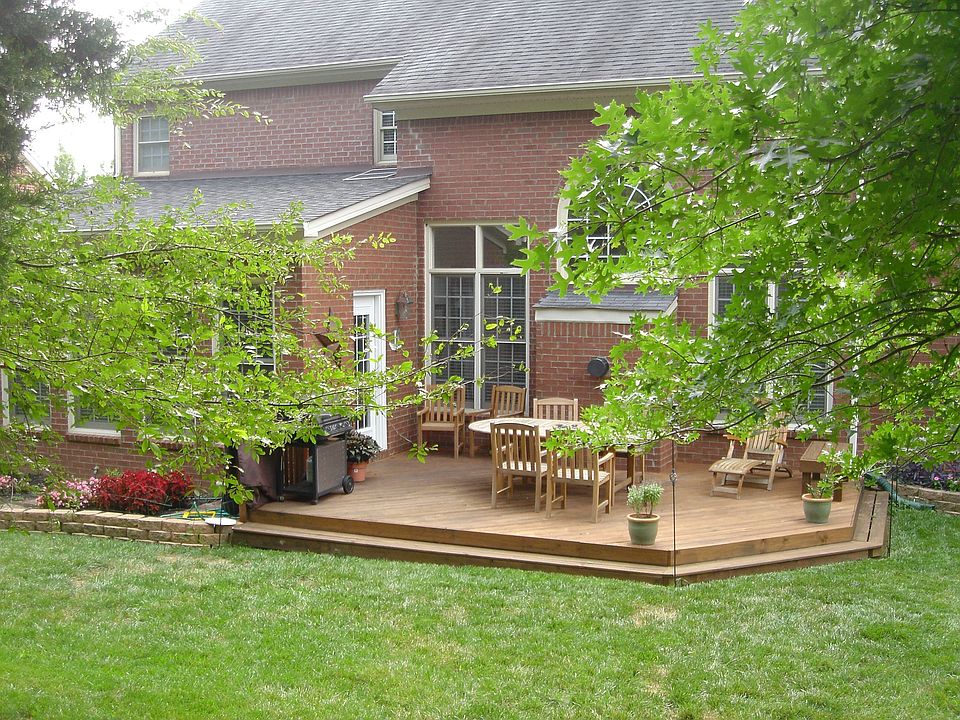 Tree-lined, fenced backyard for complete privacy.
