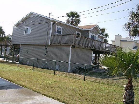 View of side elevation taken from the street.
