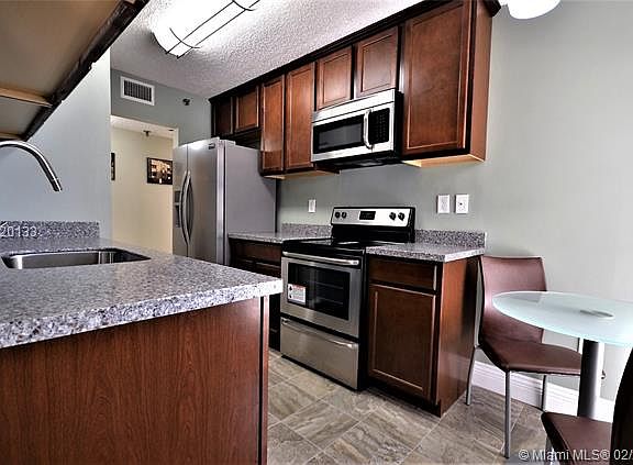 5th image of 6061 Collins Ave APT 5E