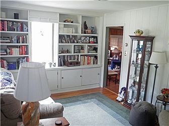 Hardwood floors & bookshelves in the living room