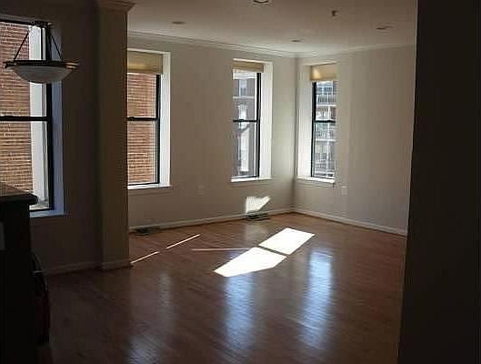 Living room on 4th floor. Kitchen is off to the left (that's the island). Fireplace is in corner on right (you can't see it in the pic).