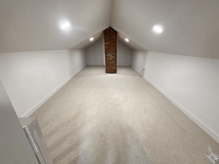 Bonus space (finished attic...not included in living space due to shorter ceiling height, but would be great as a play space or game room)