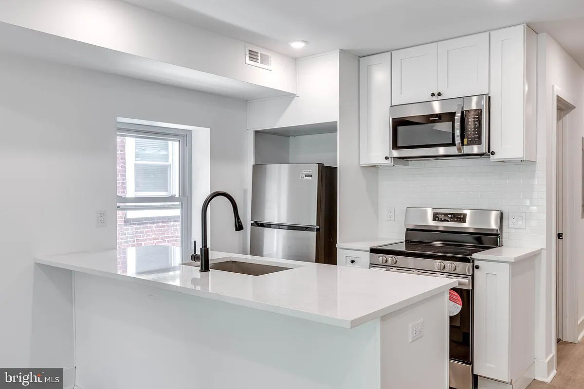 Building Photo - 4220 Baltimore Ave #4