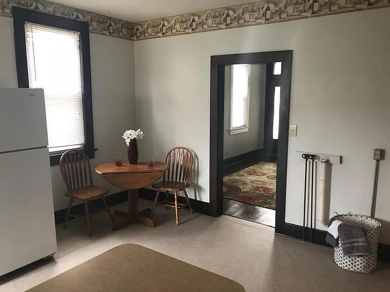 #2 photo of kitchen looking into living room. washer dryer hookups on your right. You supply washer & dryer.