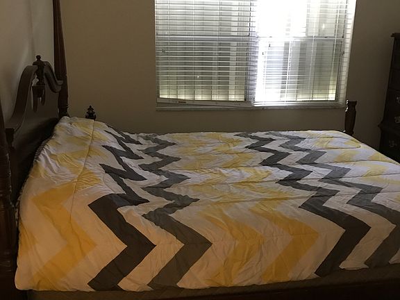 Master bedroom view of pond