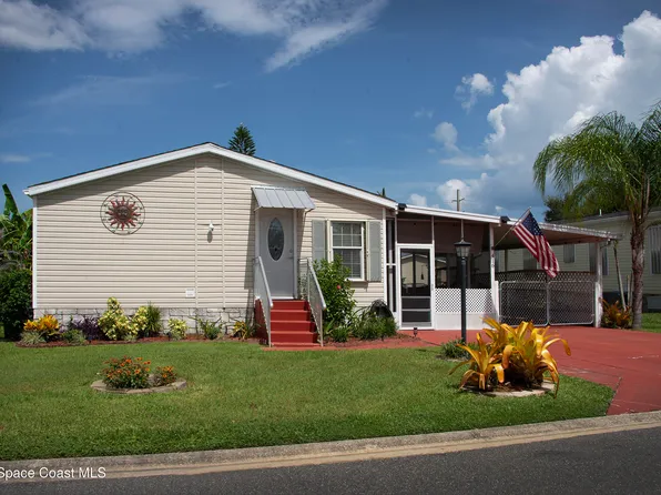 416 Plover Dr, Barefoot Bay, FL 32976