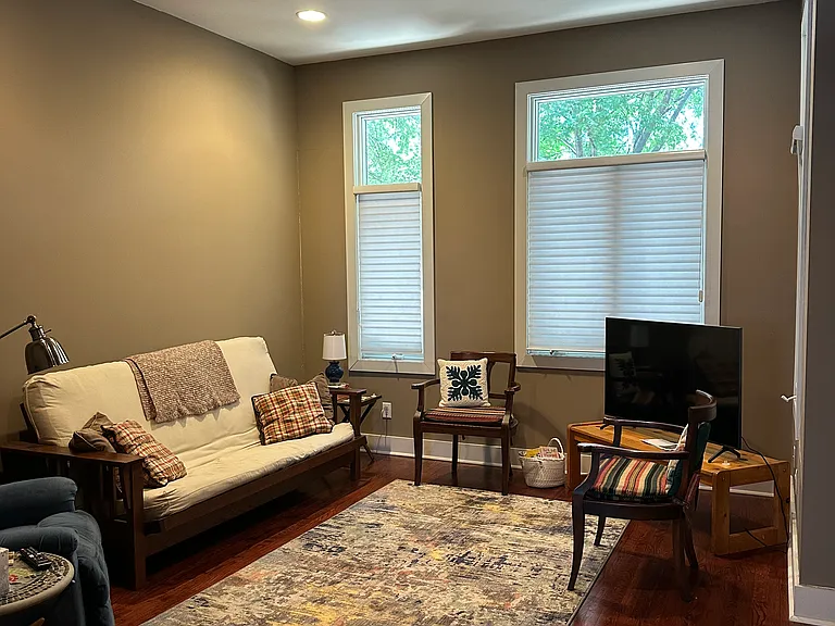 Living Room with lot of natural light and high ceilings.