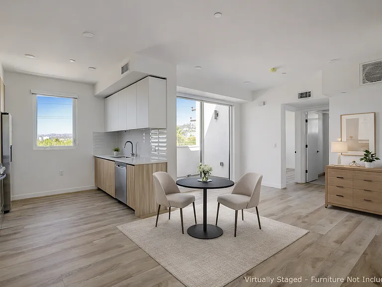 Certain photos may include virtual staging for illustrative purposes only. Furniture and decor shown are not included in the lease. No structural changes, alterations to layout, finishes, fixtures, or views have been made to the unit.