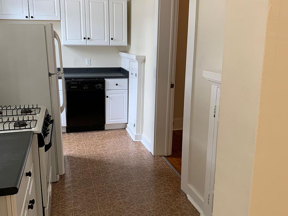 Kitchen with full size dishwasher and gas range