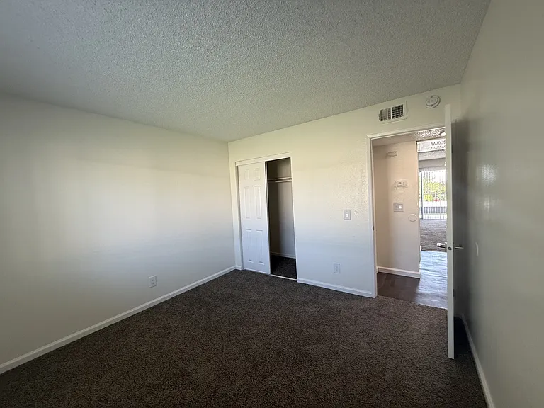 Spacious bedroom with good size closet.