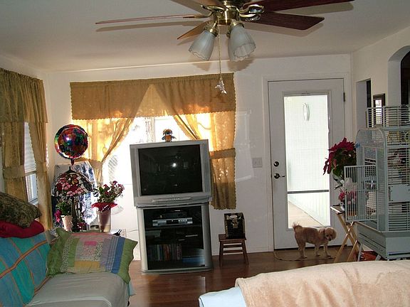 Family Room w/ laminate floors, partial view