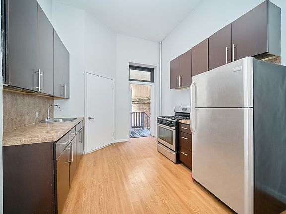 3rd image of 501 1/2 W 43rd St APT 1E
