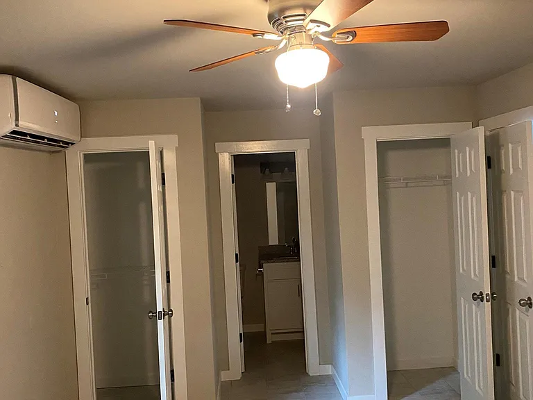 Two closets in bedroom