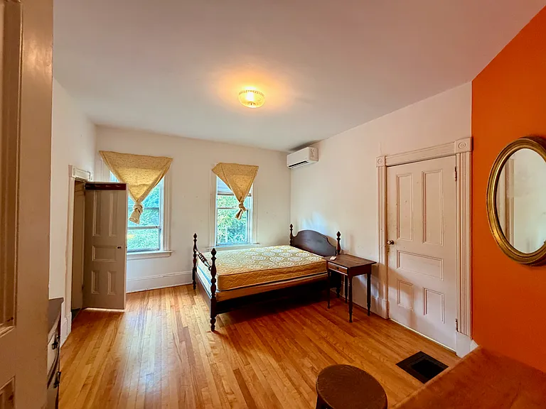 Downstairs side bedroom (open door = closet; closed door = full bath)