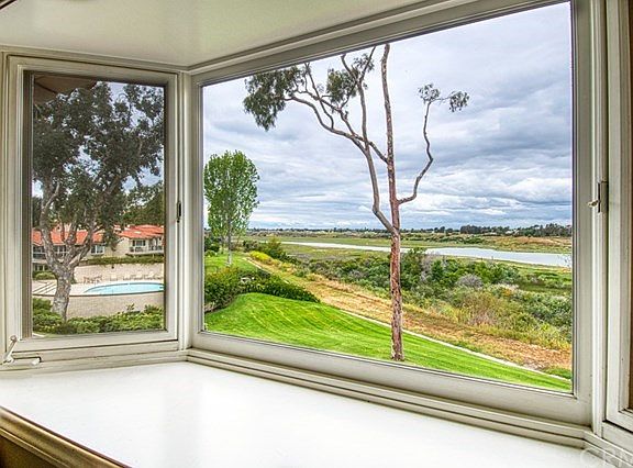 View from Master Bedroom of Back Bay and Association Pool