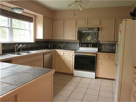 Kitchen with tons of cabinets.