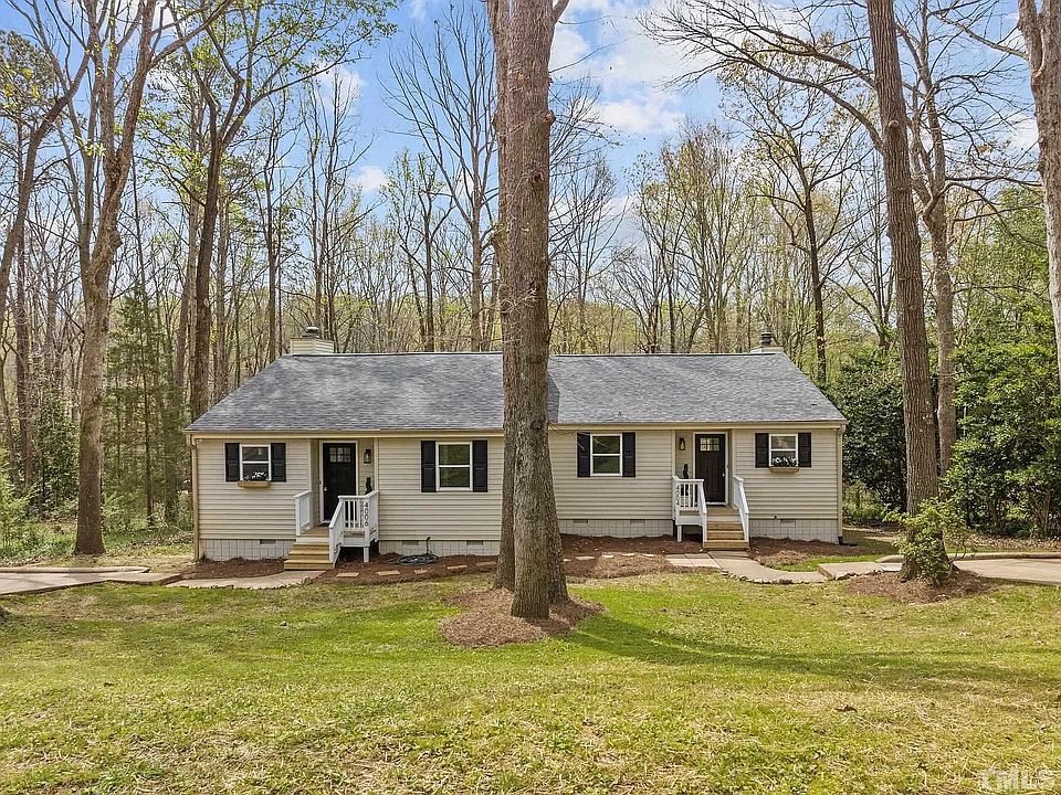 Duplex in a quiet neighborhood with lots of trees and a pond in the back yard
