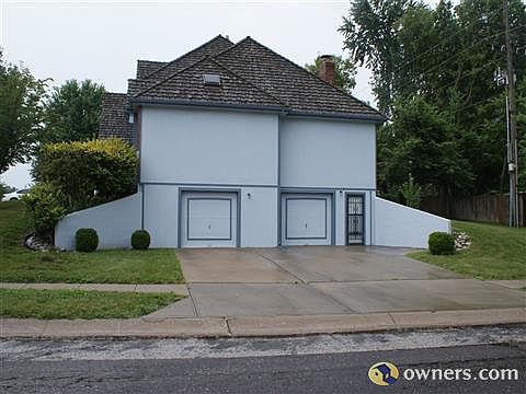 West side with two garages in basement