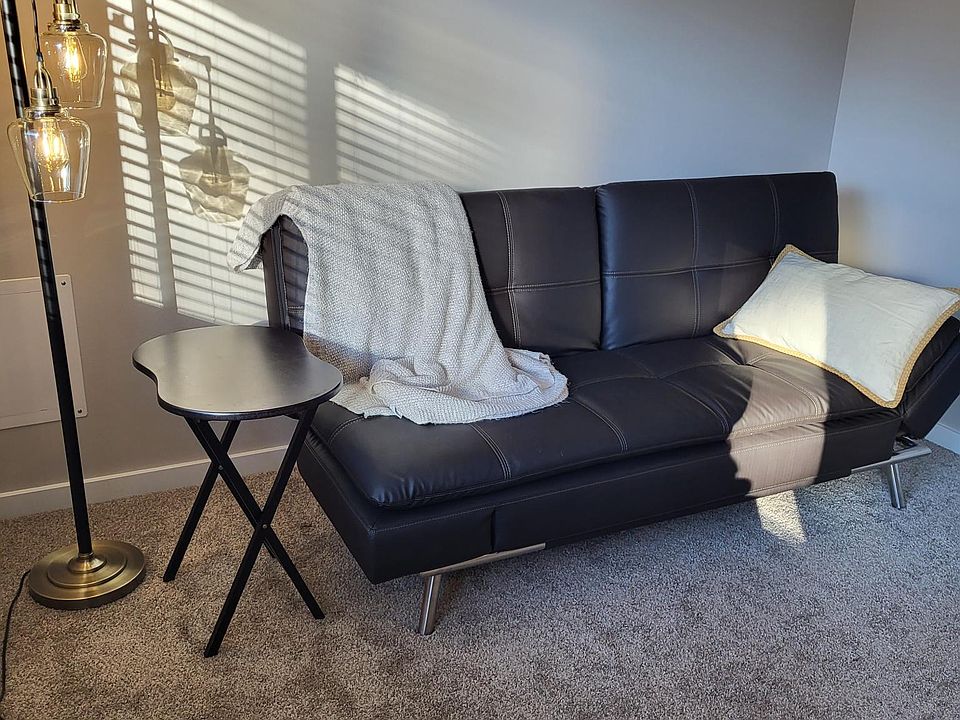 New flex sofa, sides fold up or go flat, split back piecws sit up straight, angled or lay flat. USB & power on side of sofa.