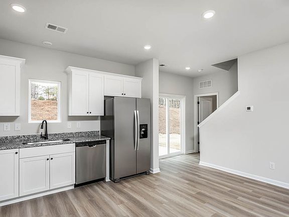 Each kitchen comes with stainless steel appliances.