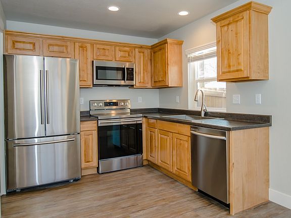Kitchen next to sliding glass door to yard