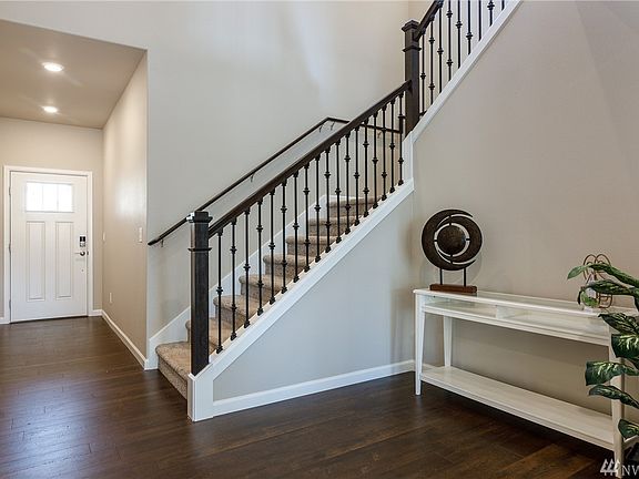 Front door opens to spacious foyer.