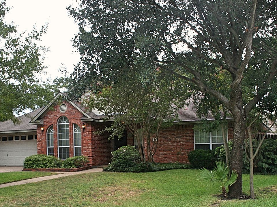 Front of house - large trees