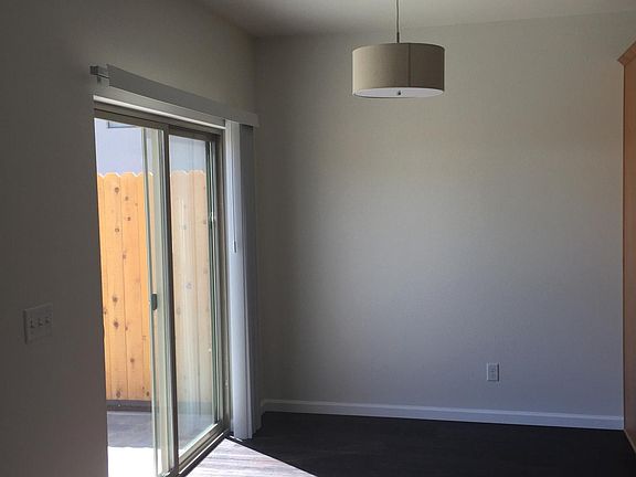 Dining area looking out slider to patio
