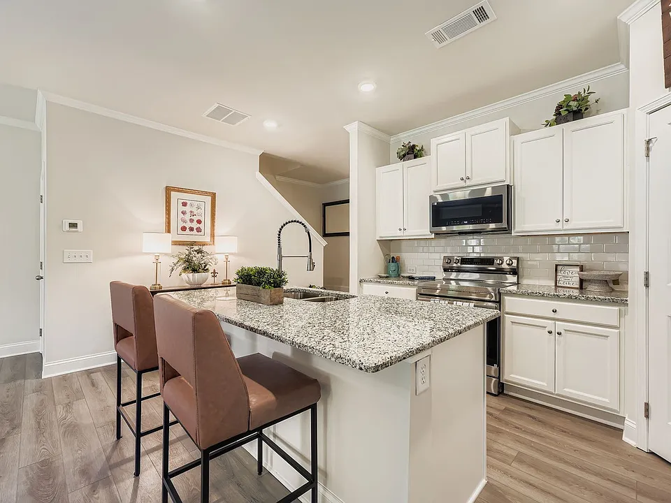Modern Kitchen with Island and Stainless Steel Appliances