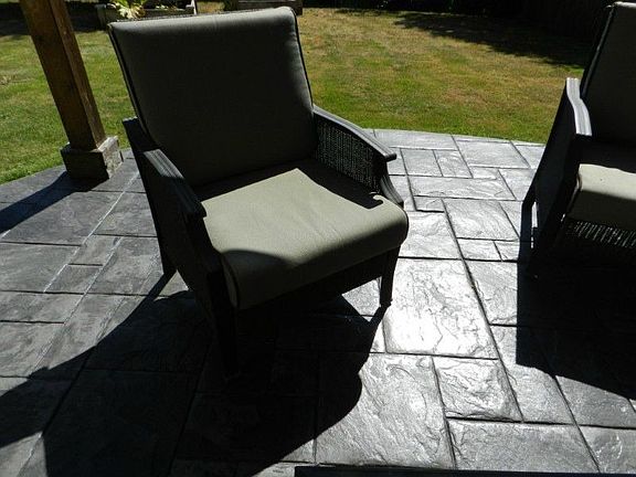 Front entrance with stamped concrete walkway & full fence
