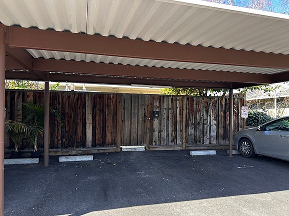 Two cars carport/back entrance