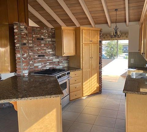 Granite counter-tops and stainless steel appliances