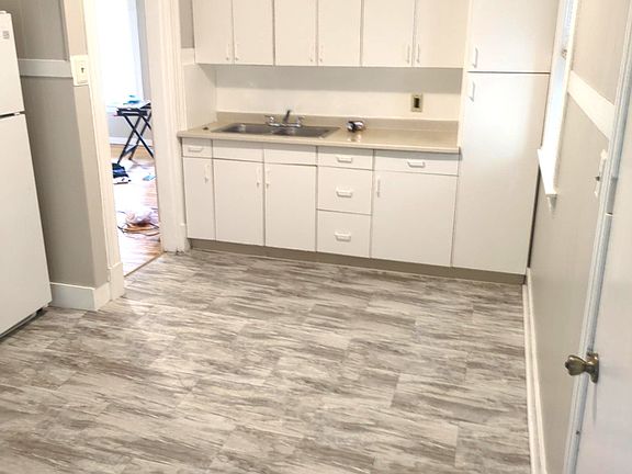 Good sized Kitchen with view to Living Room. Plenty of room for a table and chairs.