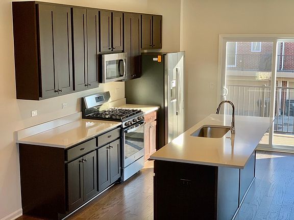 Upgrade Kitchen with White Quartz Countertop and Brand New Stainless Appliance and Sensor Touchless Kitchen Sink Faucets.