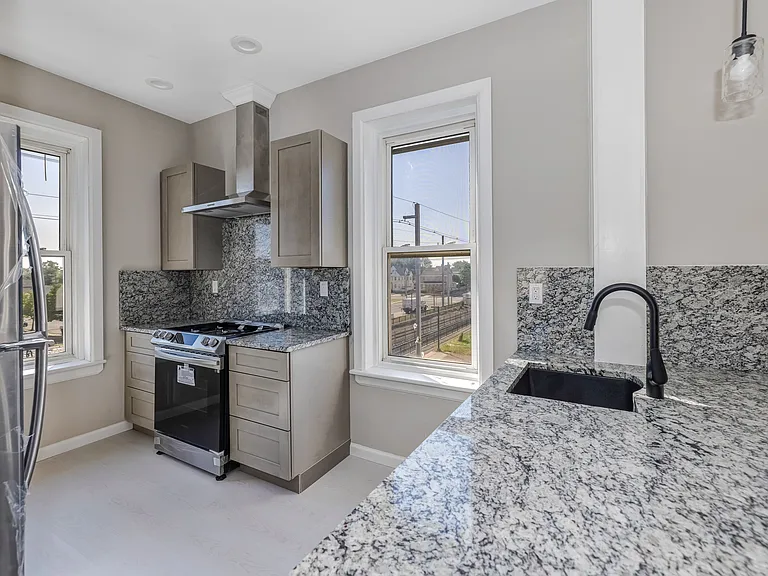 Bright and sunny kitchen with new cabinetry.