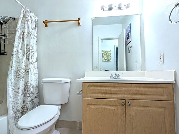 Bathroom with tub and shower