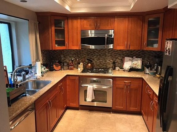 Upgraded Kitchen. Granite counters, stainless steel appliances and gas stove.
