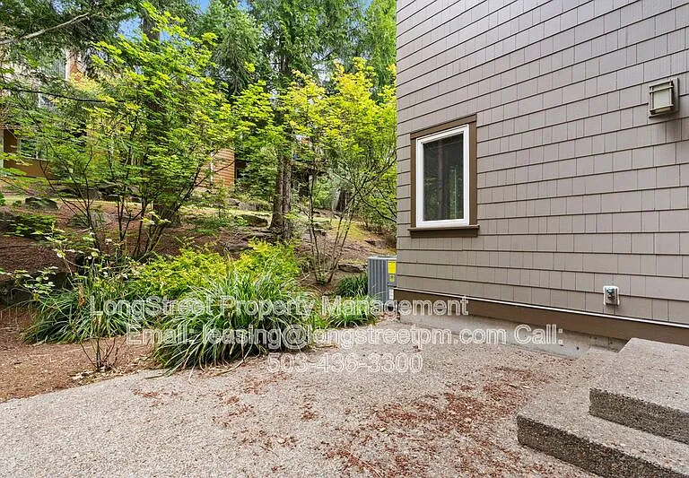 10247 NW Village Heights Dr — Photo 50