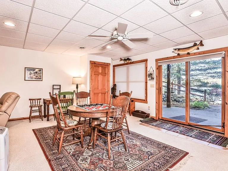 Lower level Family Room with walk out to patio and lake views.