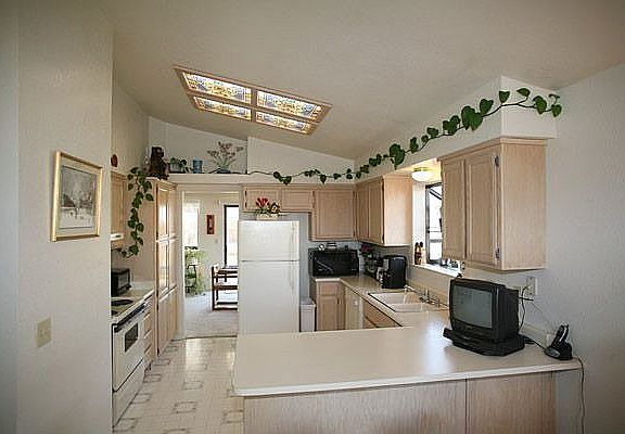 Large kitchen with breakfast bar and nook