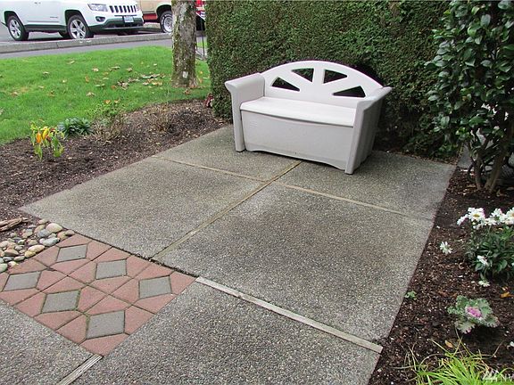 Just enough space for sitting outside and a little gardening. Flower beds taken care of by the homeowner but lawns are mowed by HOA.