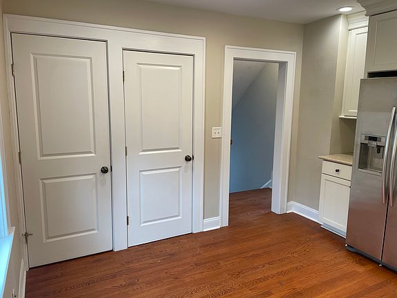 Laundry and pantry closet in kitchen.