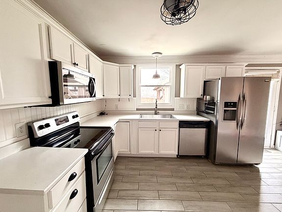 Recently replaced countertops and floor