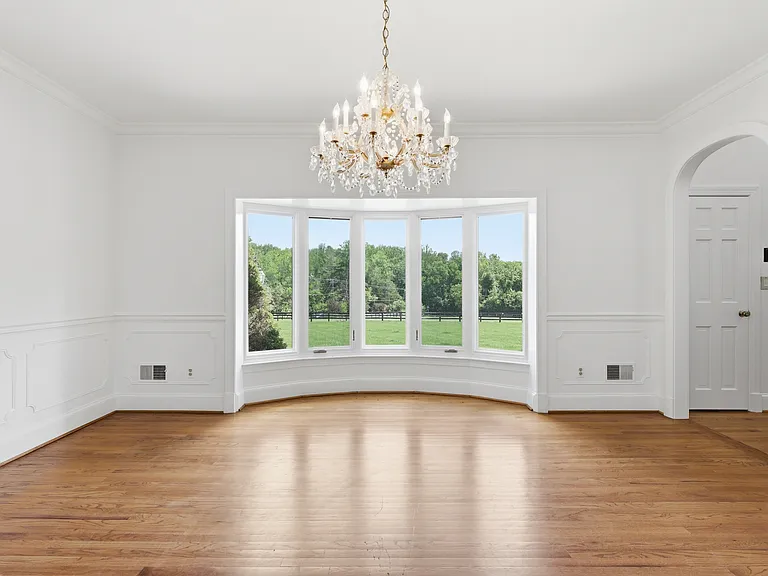 Elegant dining room next to kitchen.