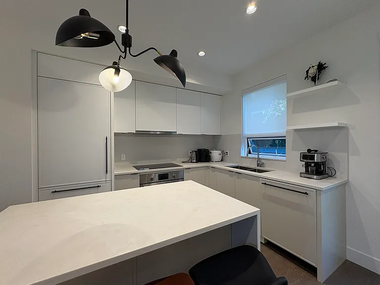 990 W 52nd Ave — Photo 4
