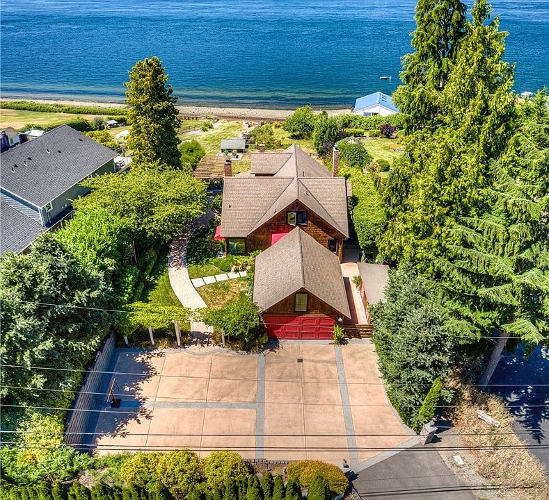 Quintessential Pacific Northwest home with unobstructed views of the Tacoma Narrows to Anderson Island and beyond.